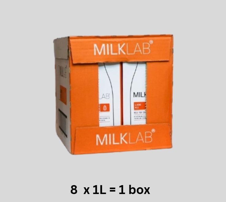 MilkLab product packaging with two bottles on a gray background
