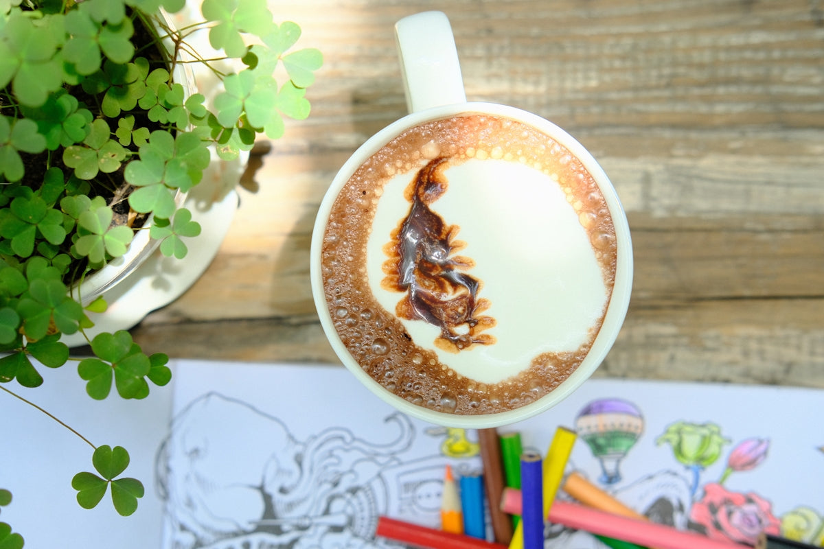 white ceramic mug with coffee