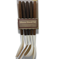 Thumbnail for Silicone utensil set with wooden handles in packaging on a white background