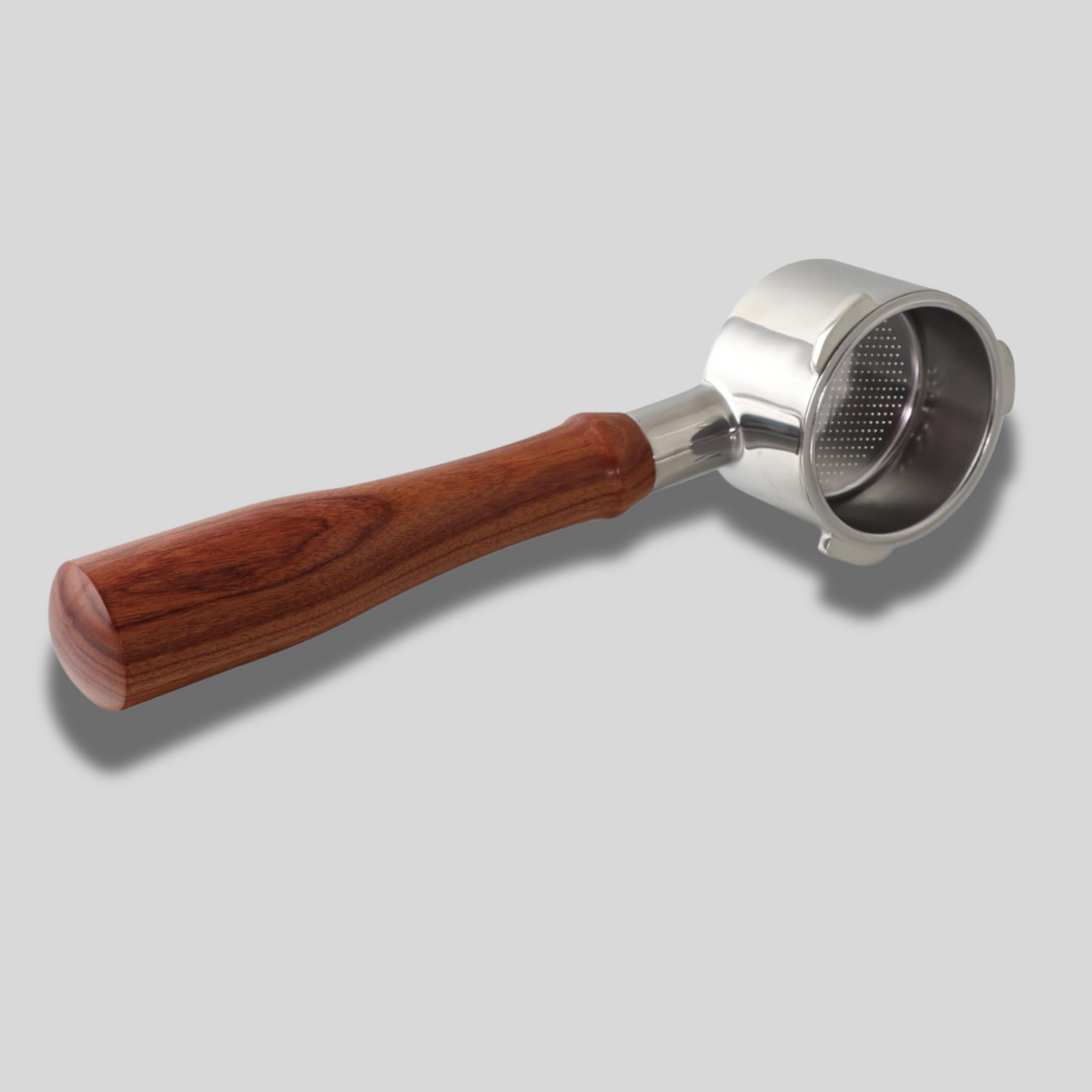 Coffee filter with wooden handle on a gray background