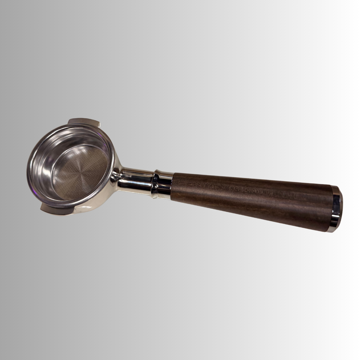 A metal portafilter with a dark brown wooden handle, shown against a light gray gradient background.