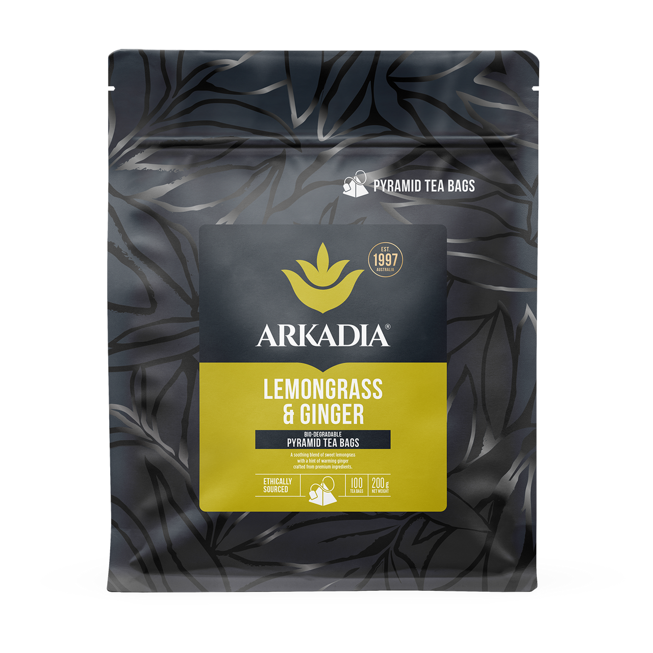 Pack of Arkadia Lemongrass & Ginger pyramid tea bags on a dark leafy background