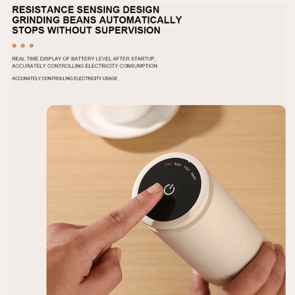 Electric coffee grinder with a hand pressing a button on a wooden surface