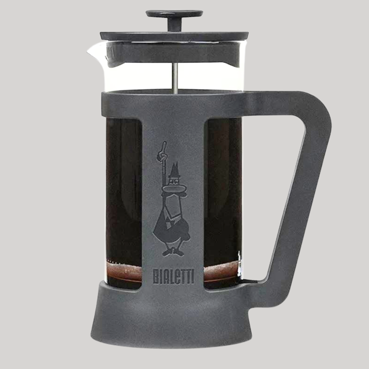 French press coffee maker with Bialetti logo on a gray background