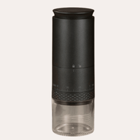 Thumbnail for Black pepper grinder with clear container on a white background
