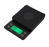 Thumbnail for A black digital pocket scale with a textured weighing platform and a green LCD display showing weight and time, photographed on a plain white background.