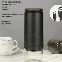 Thumbnail for Black portable coffee grinder with USB charging cable on a gray background