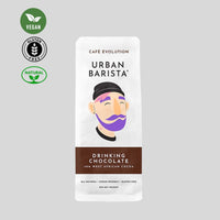 Thumbnail for Urban Barista drinking chocolate package with branding and certification logos on a gray background