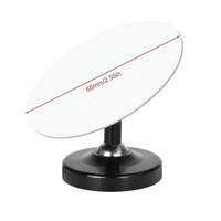 Thumbnail for Small round mirror with black base on a white background