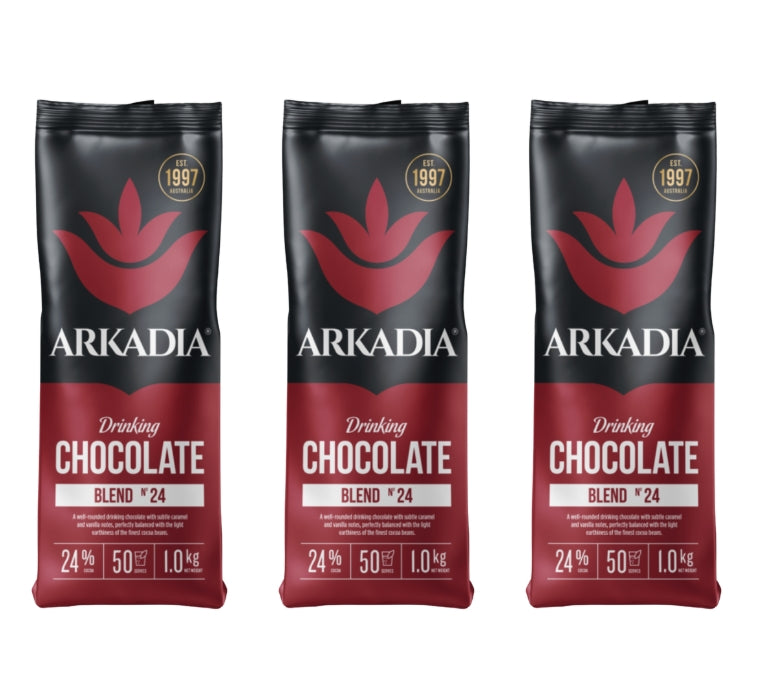 Three packages of Arkadia drinking chocolate on a white background