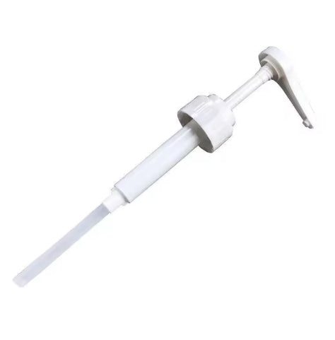 White plastic tool with a long cylindrical shaft and a curved metallic end on a white background