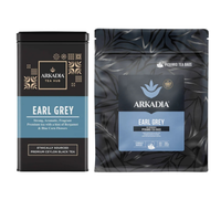 Thumbnail for Two Arkadia Tea Hub Earl Grey tea products shown side by side on a white background: a black metal tin and a black resealable pouch with a blue label panel.