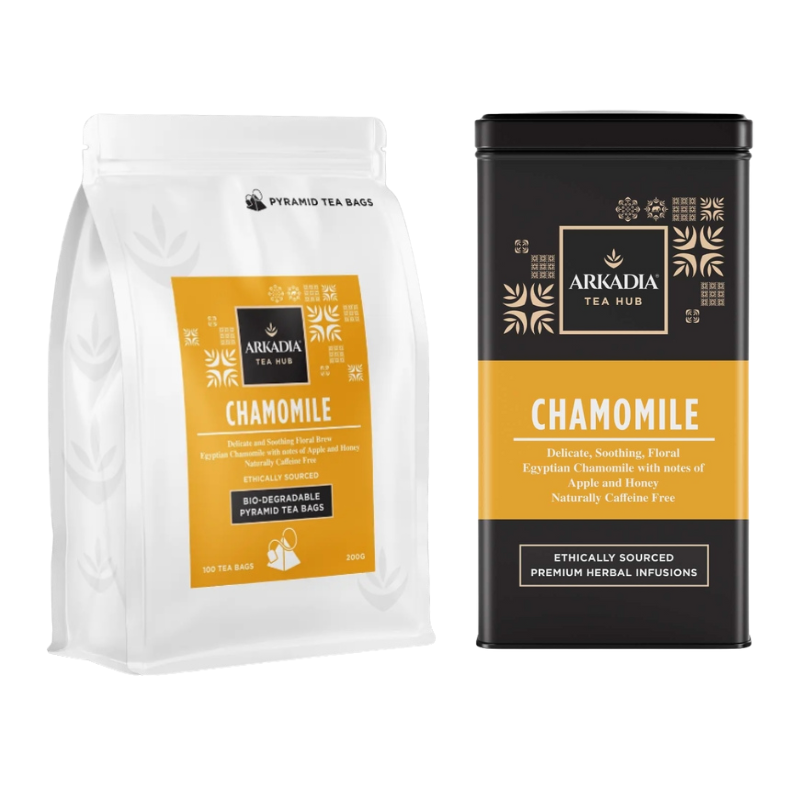 Arkadia chamomile tea packaging including a white bag and black tin on a white background