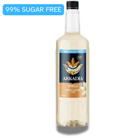 Thumbnail for Bottle of Arkadia vanilla syrup with a label indicating 99% sugar-free on a white background.
