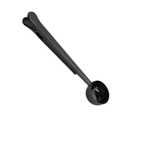 Thumbnail for Black measuring spoon on a white background