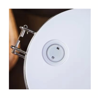 Thumbnail for Close-up of a white socket on a white surface with a dark background