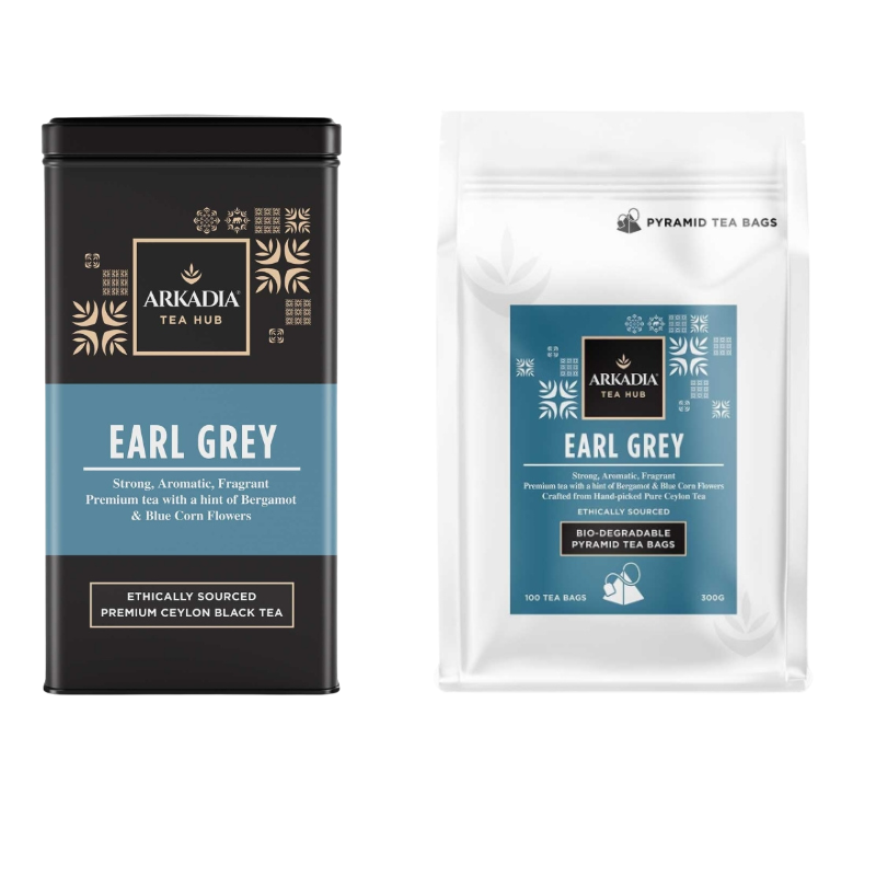 Arkadia Tea Hub Earl Grey tea packaging including a metal tin and pyramid tea bags on a white background.