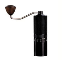 Thumbnail for Black manual coffee grinder with wooden handle on a white background