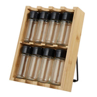 Thumbnail for Set of glass spice jars with black lids in a wooden holder on a white background
