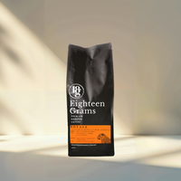Thumbnail for Eighteen Grams Royale light-medium roast coffee bag on a soft neutral background 250g