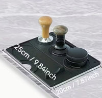 Thumbnail for Black rectangular device with wooden and metal components on a light gray background