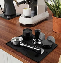Thumbnail for Coffee brewing equipment on a wooden counter with a plant in the background