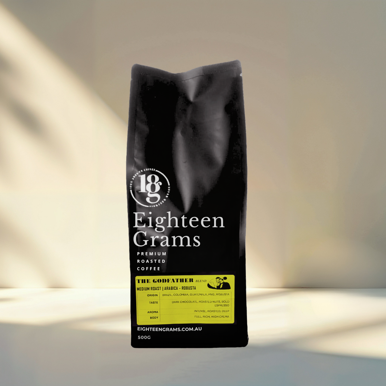 Black coffee bag with 'Eighteen Grams' branding on a neutral background.the-godfather-blend-medium-roast-coffee-beans-500g